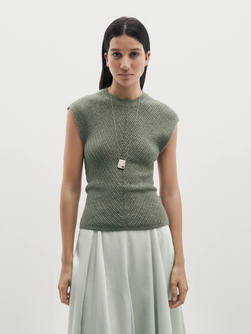 Sleeveless knit top with openwork details