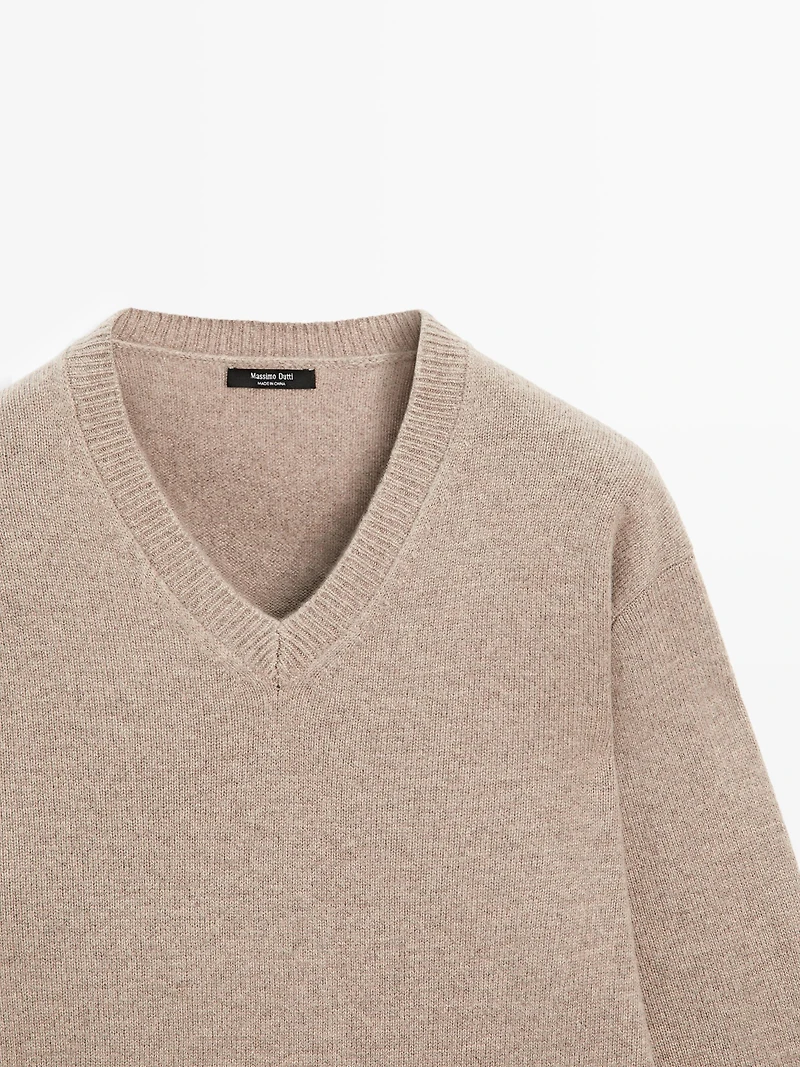 V-neck knit sweater with elbow patches