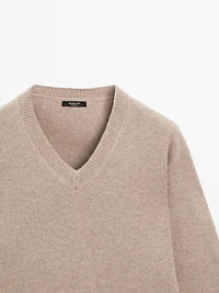 V-neck knit sweater with elbow patches