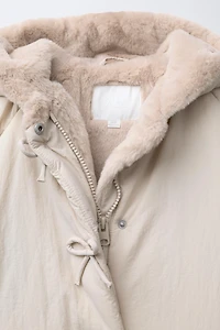 WATER REPELLENT PUFFER COAT WITH BOWS