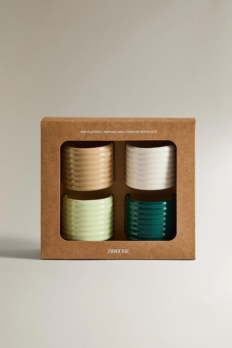 LOT DE PORTE-SERVIETTES EN CÉRAMIQUE EN RELIEF (LOT DE 4)