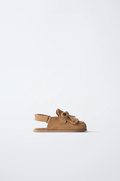 SABOTS EN CUIR PIEDS NUS
