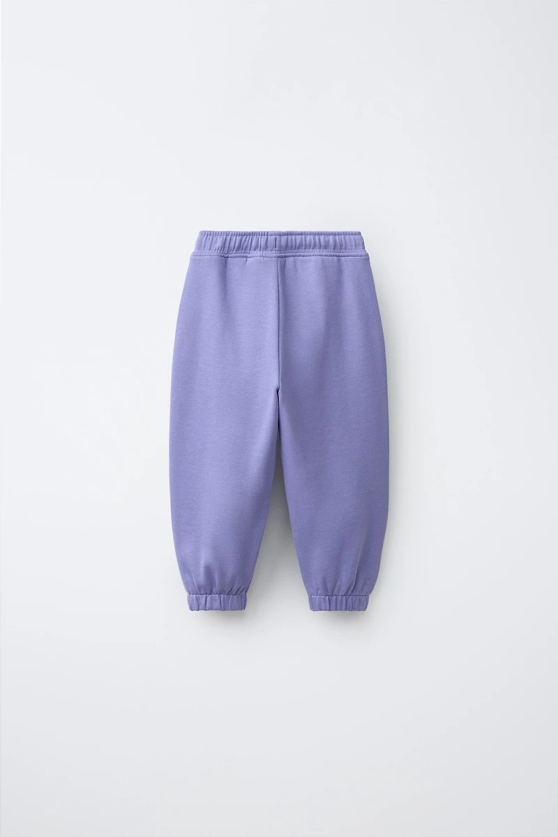 PANTALON EN MOLLETON BRODÉ MARGUERITE