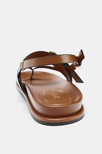 STRAPPY BUCKLE SANDALS