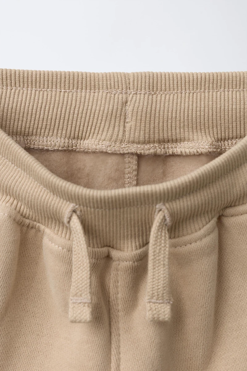 PANTALON DE JOGGING LOGO FLOCK