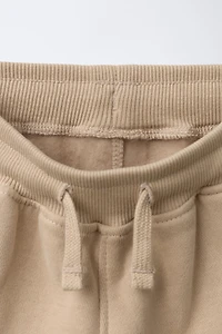 PANTALON DE JOGGING LOGO FLOCK