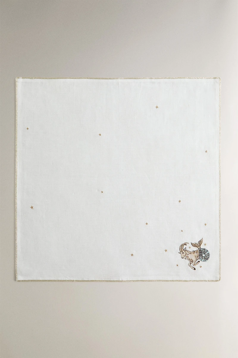 EMBROIDERED LINEN CAPRICORN NAPKIN | MARISA BERENSON