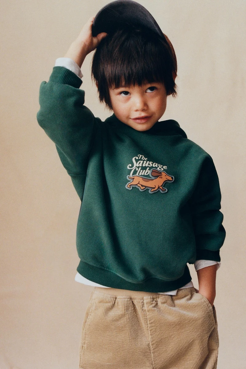 SWEAT À CAPUCHE CHIEN SAUCISSE