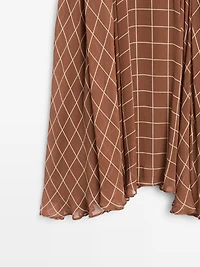 Long flowing skirt with checked detail