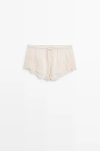 Flowing shorts with embroidered detail