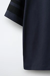 T-SHIRT AVEC PIÈCE NUMÉRO