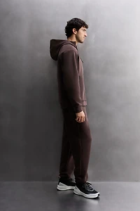 SWEAT TECHNIQUE À CAPUCHE ZIPPÉ