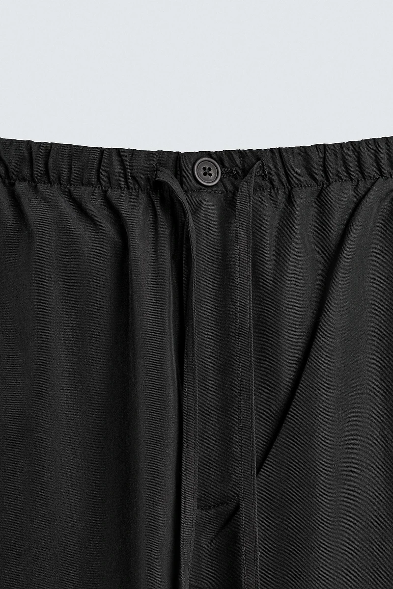 RELAXED FIT FLOWY PANTS