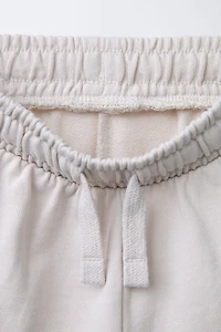 TEXT JOGGING SHORTS