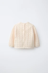 PULL EN MAILLE AJOURÉE À FLEURS BRODÉES