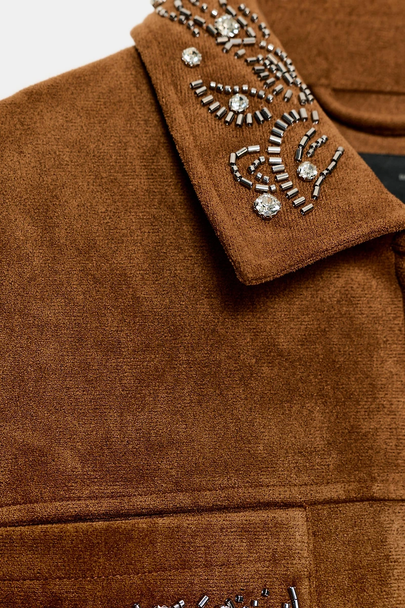 VESTE EFFET DAIM À CLOUS