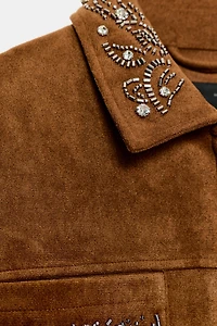 VESTE EFFET DAIM À CLOUS
