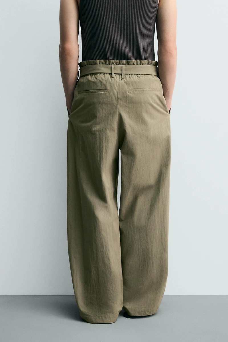 BELTED PLEATED WIDE FIT PANTS