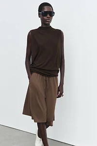 FLOWY MOCK NECK TOP