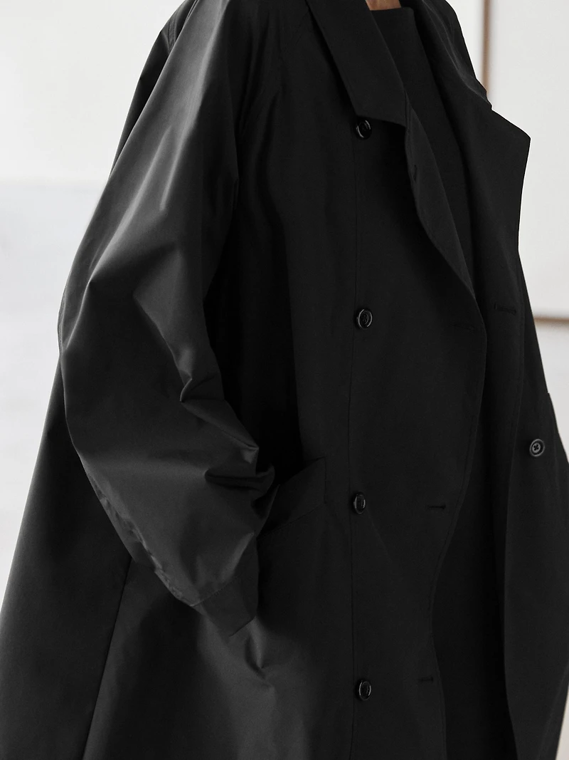 Double-breasted technical trench coat