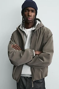 LIGHTWEIGHT HOODED TECHNICAL JACKET