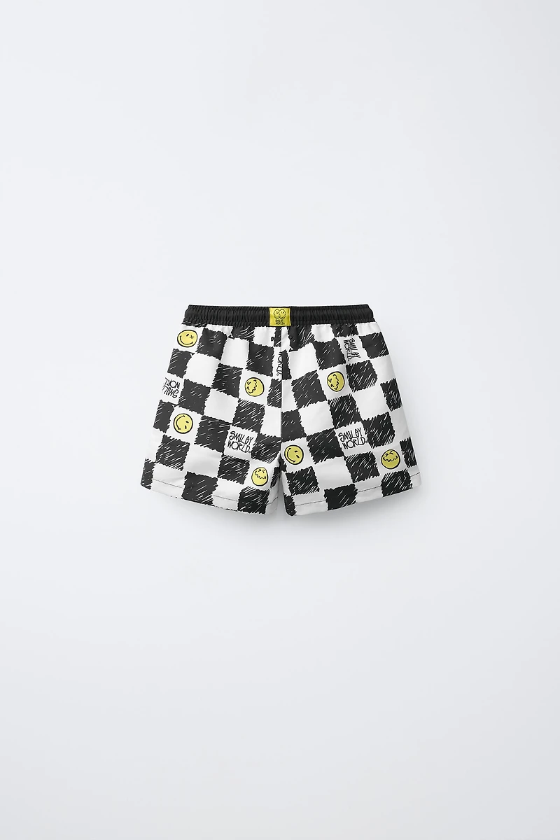 6-14 YEARS/ CHECKERBOARD SMILEYWORLD ® SWIM SHORTS