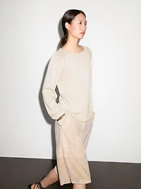 Purl knit cutwork sweater