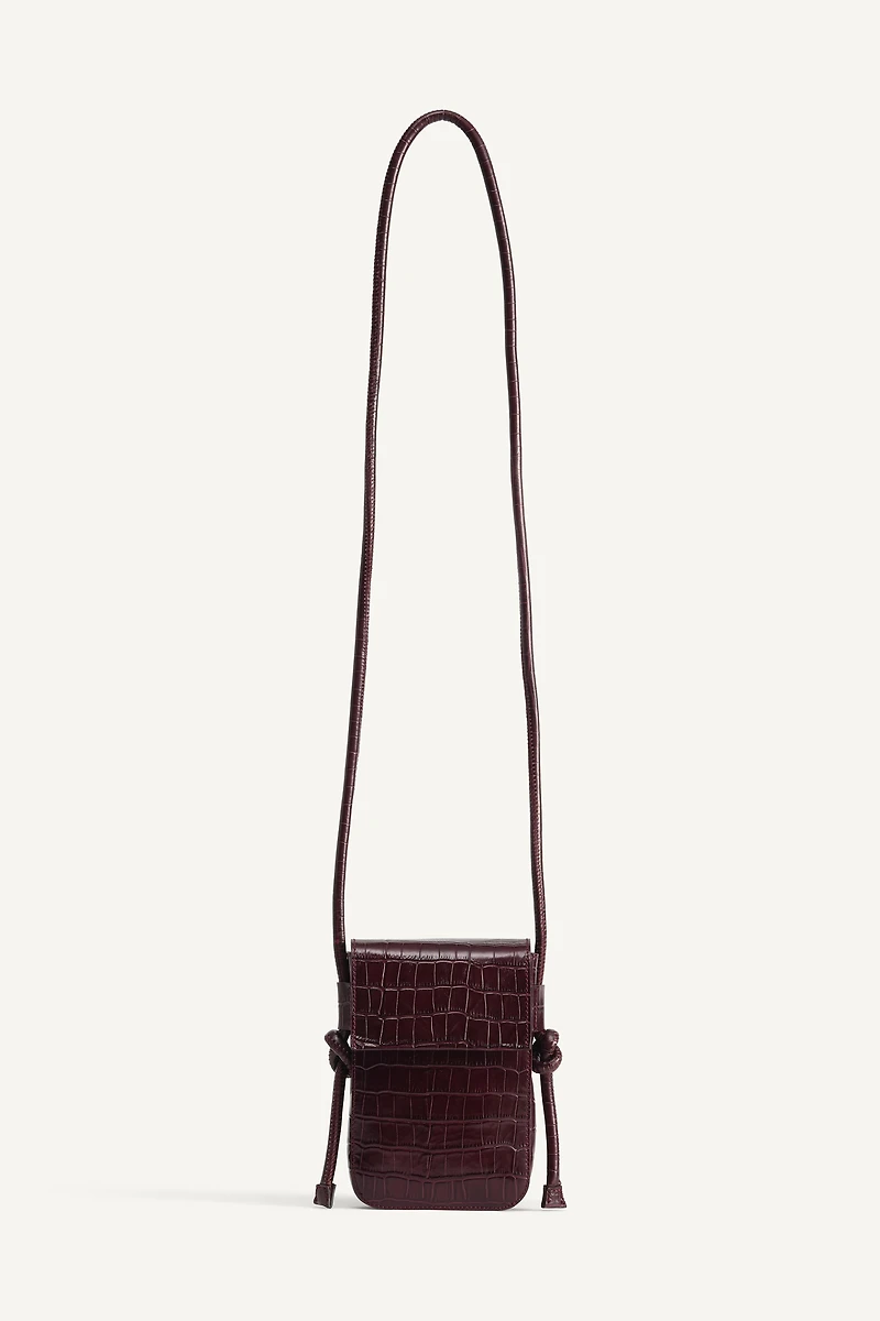 LIMITED EDITION EMBOSSED LEATHER CROSSBODY BAG