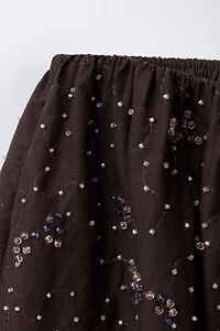 JUPE-SHORT AVEC FANTAISIE