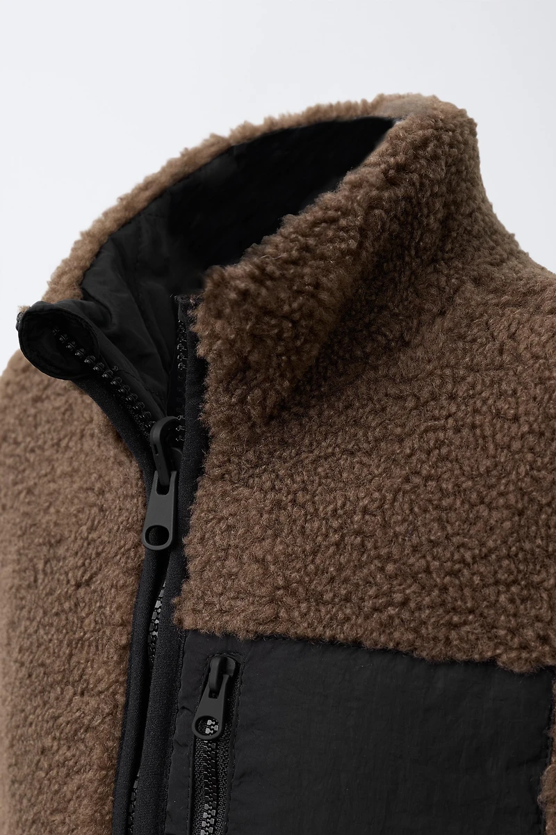 REVERSIBLE FLEECE VEST