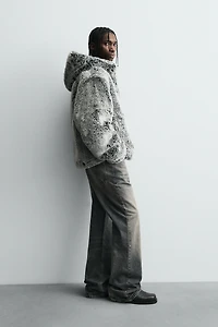 BLOUSON EFFET FOURRURE À CAPUCHE