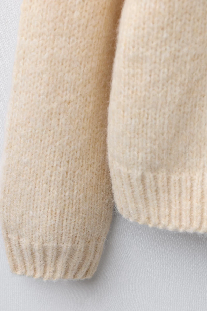 PULL EN MAILLE FLEURS ORGANZA