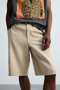 BAGGY FIT BERMUDA SHORTS © OTIS KWAME KYE QUAICOE