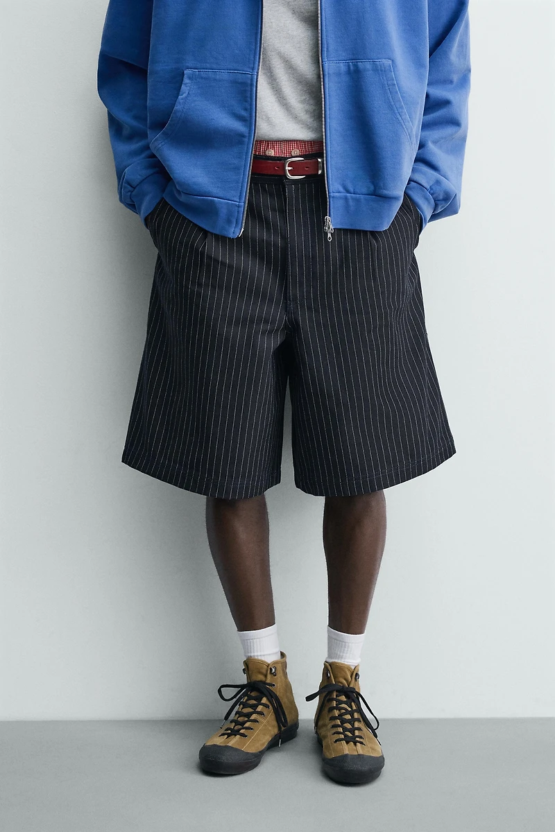 PINSTRIPED PLEATED SHORTS