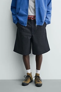 PINSTRIPED PLEATED SHORTS