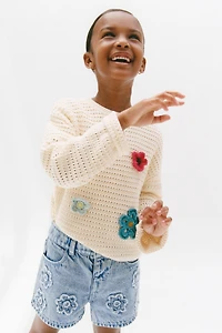 PULL EN MAILLE À FLEURS