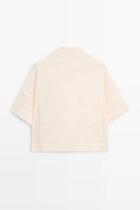 100% cotton polo shirt with embroidered detail