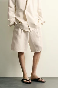 WIDE FIT PLEATED SHORTS