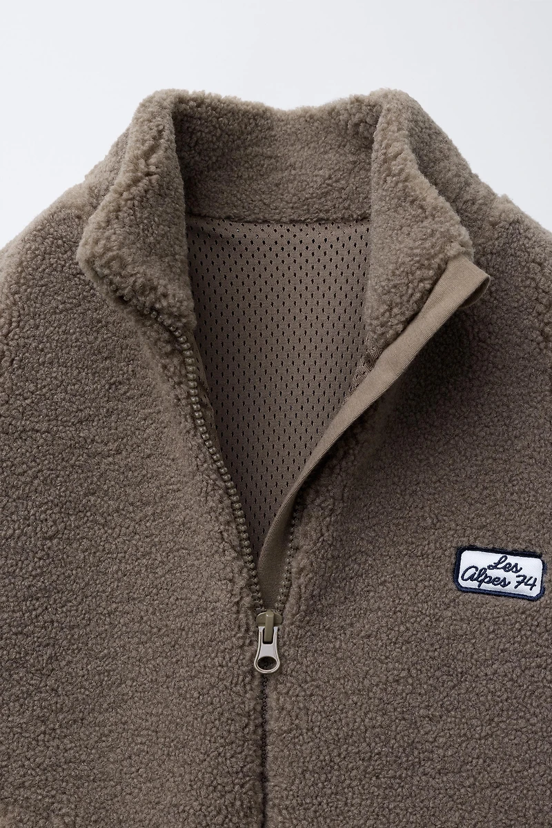 BLOUSON EFFET MOUTON BRODÉ