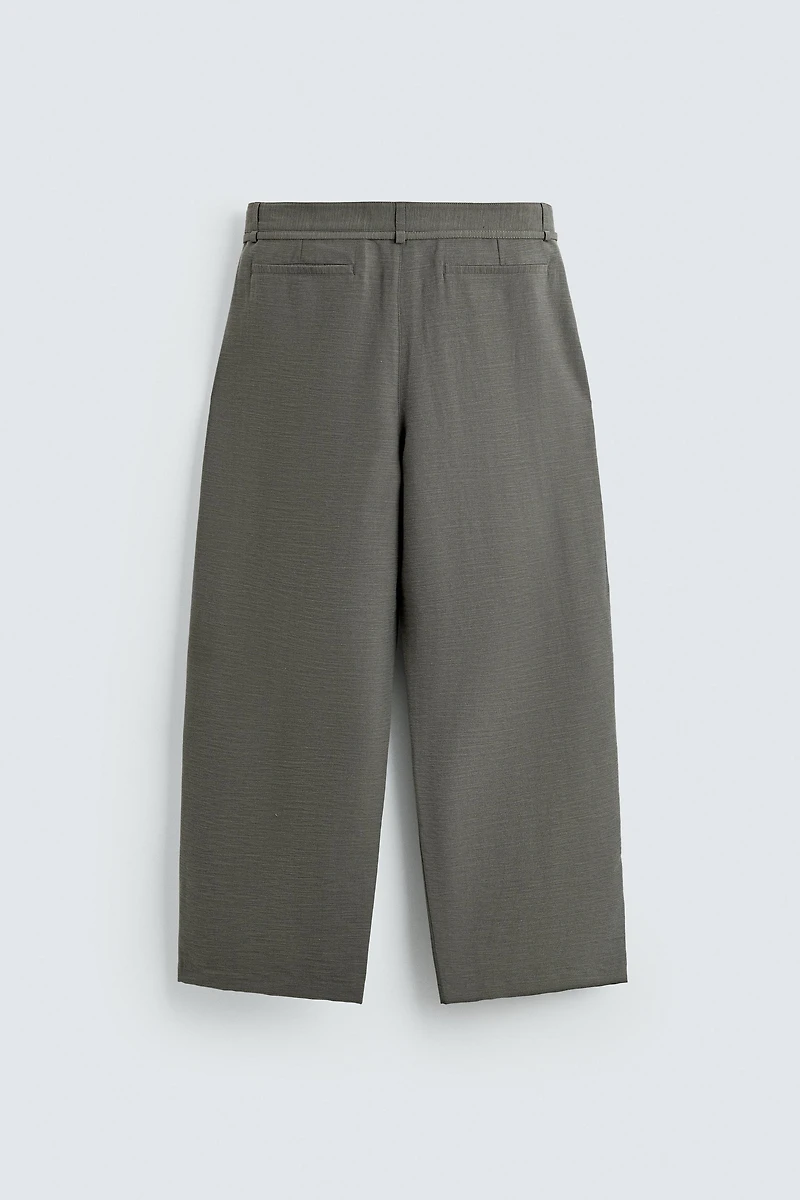 BALLOON FIT PLEATED BELTED PANTS