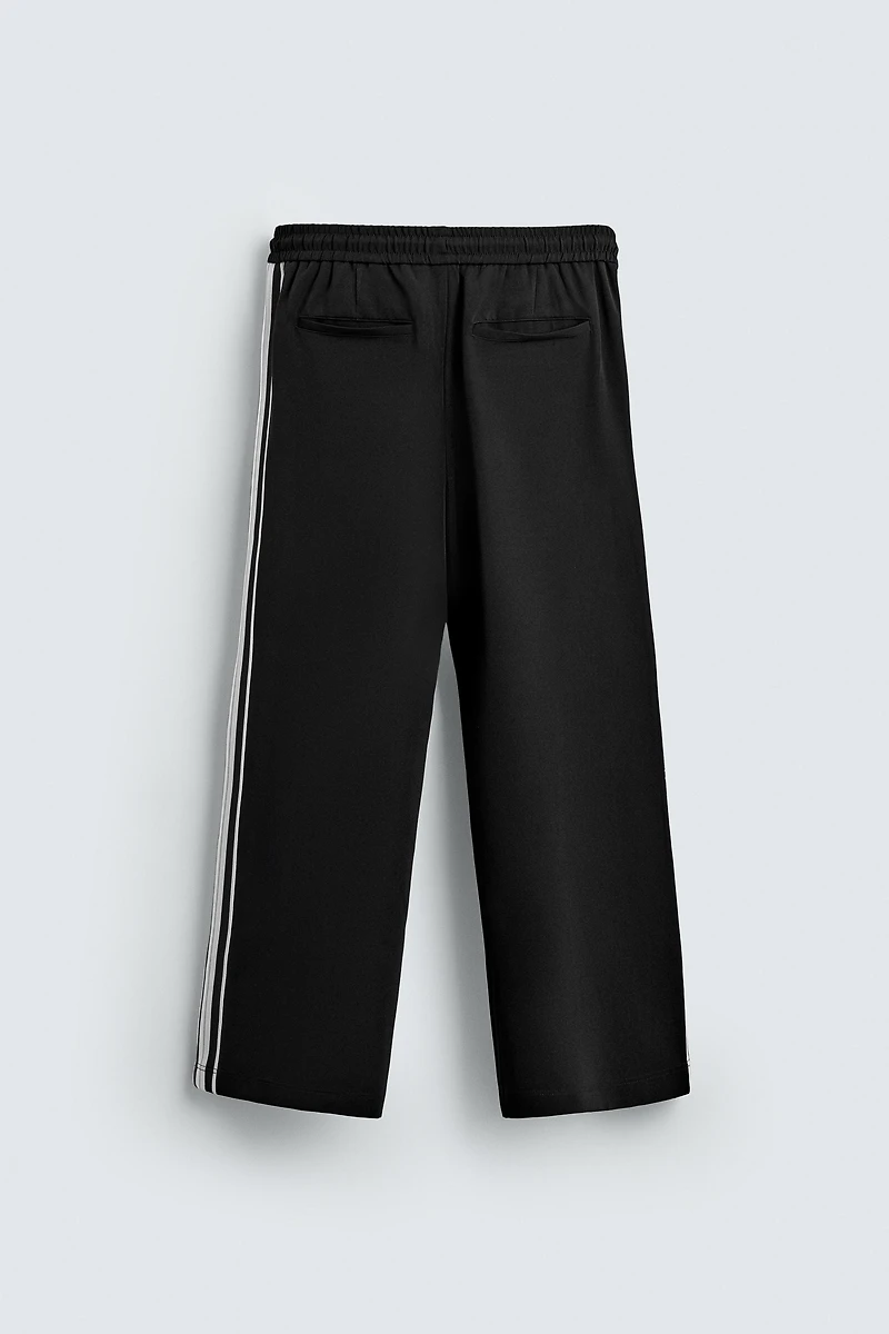 WIDE FIT JOGGER PANTS WITH SIDE STRIPES