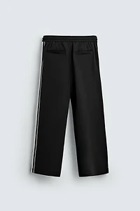WIDE FIT JOGGER PANTS WITH SIDE STRIPES