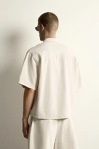 BOXY FIT STRIPED POLO SHIRT