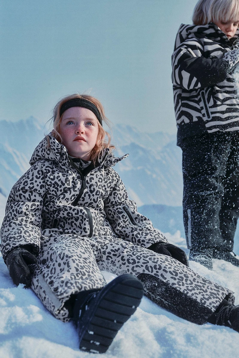 WATER RESISTANT AND WINDPROOF ANIMAL PRINT LONG JUMPSUIT