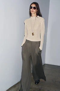 PULL EN MAILLE À COL CHEMINÉE