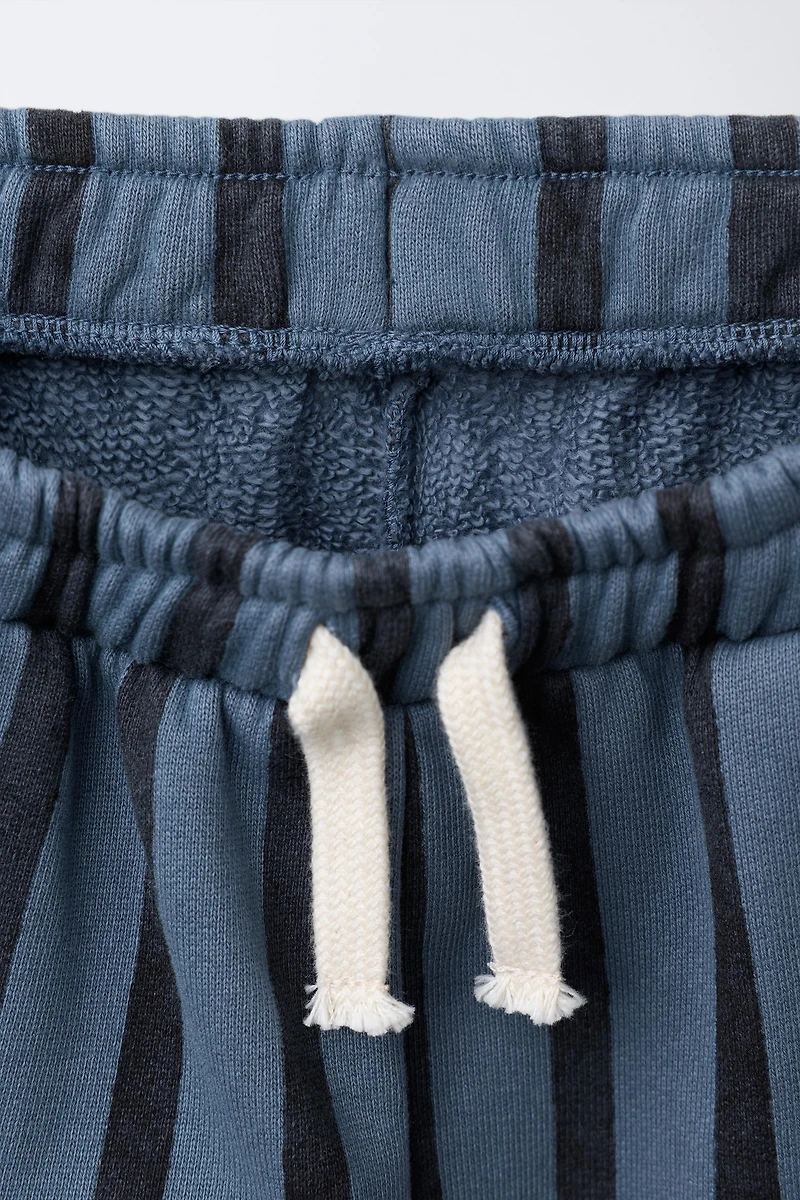 PANTALON EN MOLLETON BAGGY À RAYURES