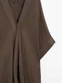 Flowing 100% linen oversize blouse with back detail