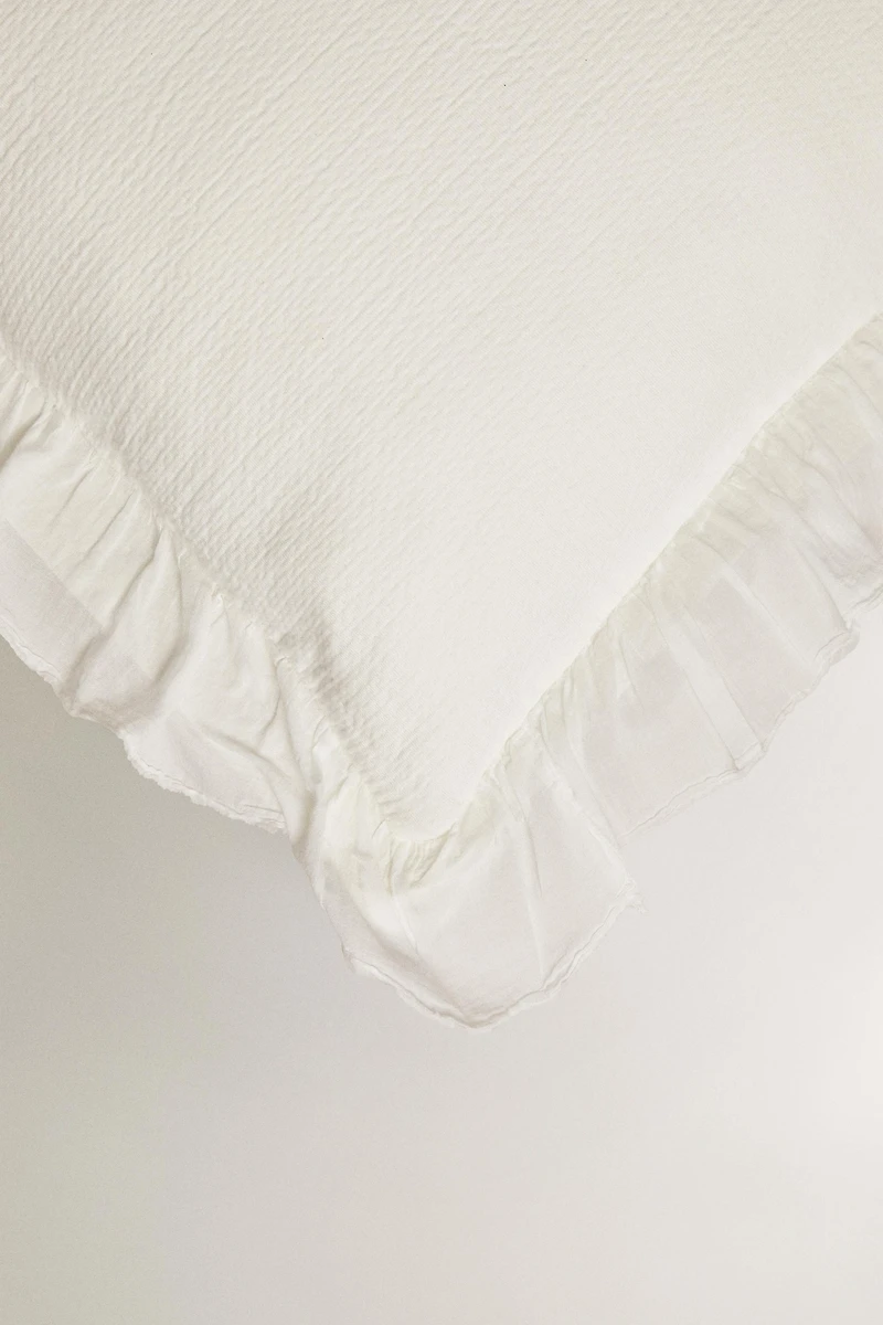 HOUSSE DE COUSSIN TEXTURE VOLANT