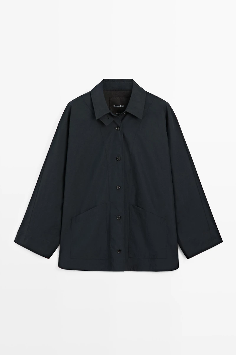 Jacket with buttoned collar strap