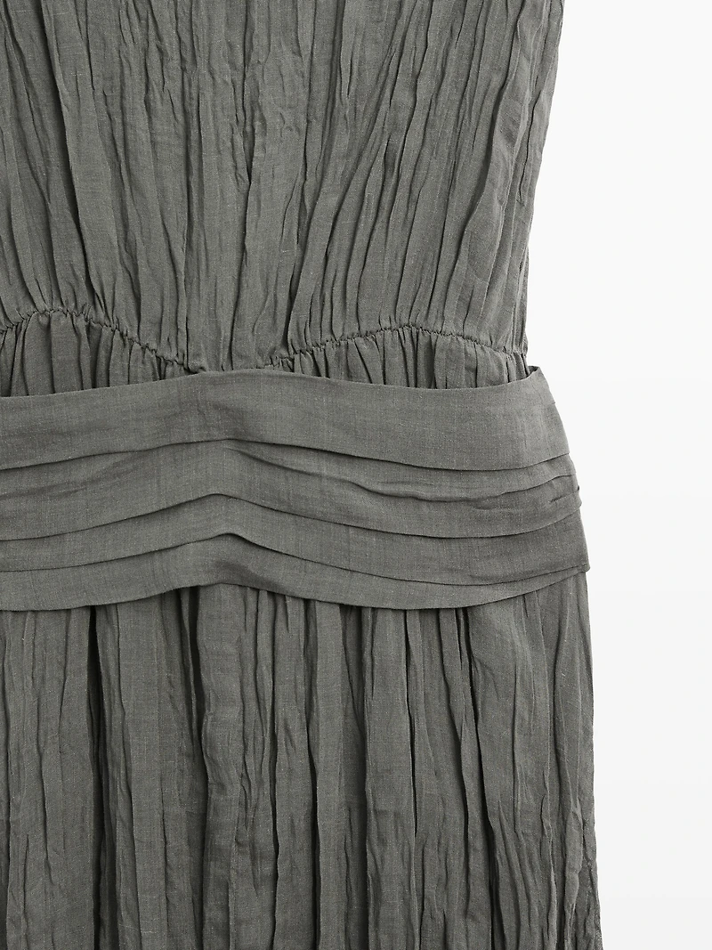 Textured flowing fabric dress with sash belt
